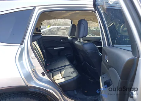 2016 Honda Cr-V Touring z USA, uszkodzony, nr VIN 5J6RM4H91GL067909